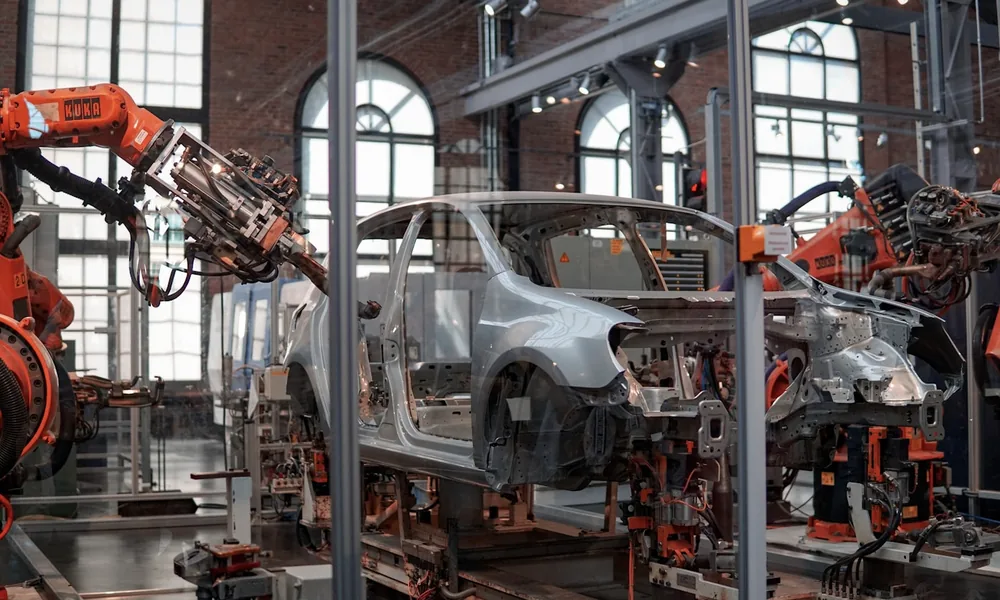 A robotic arm on a manufacturing production line in a factory